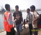 Outreach worker educating migrants at the border in Banabasa